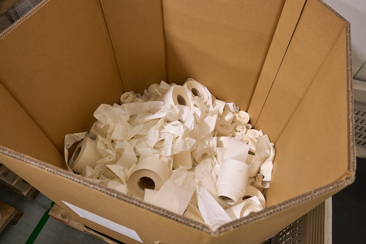Bulk bin of label backing paper for recycling